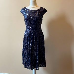 Navy color beaded dress. Just like New